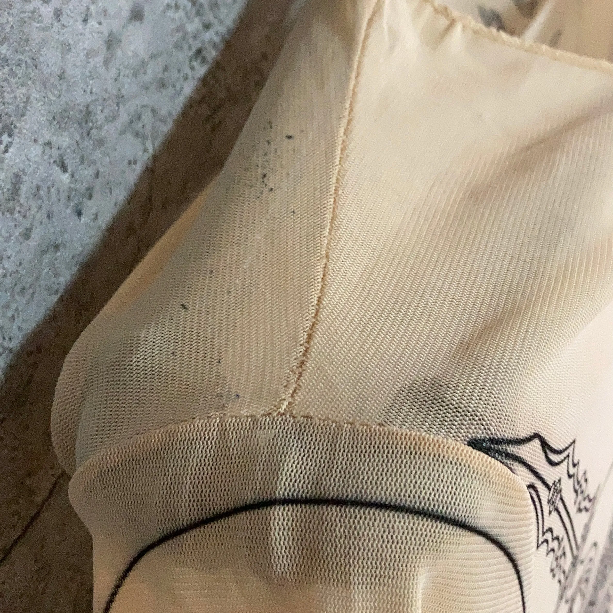 see-through tattoo tops